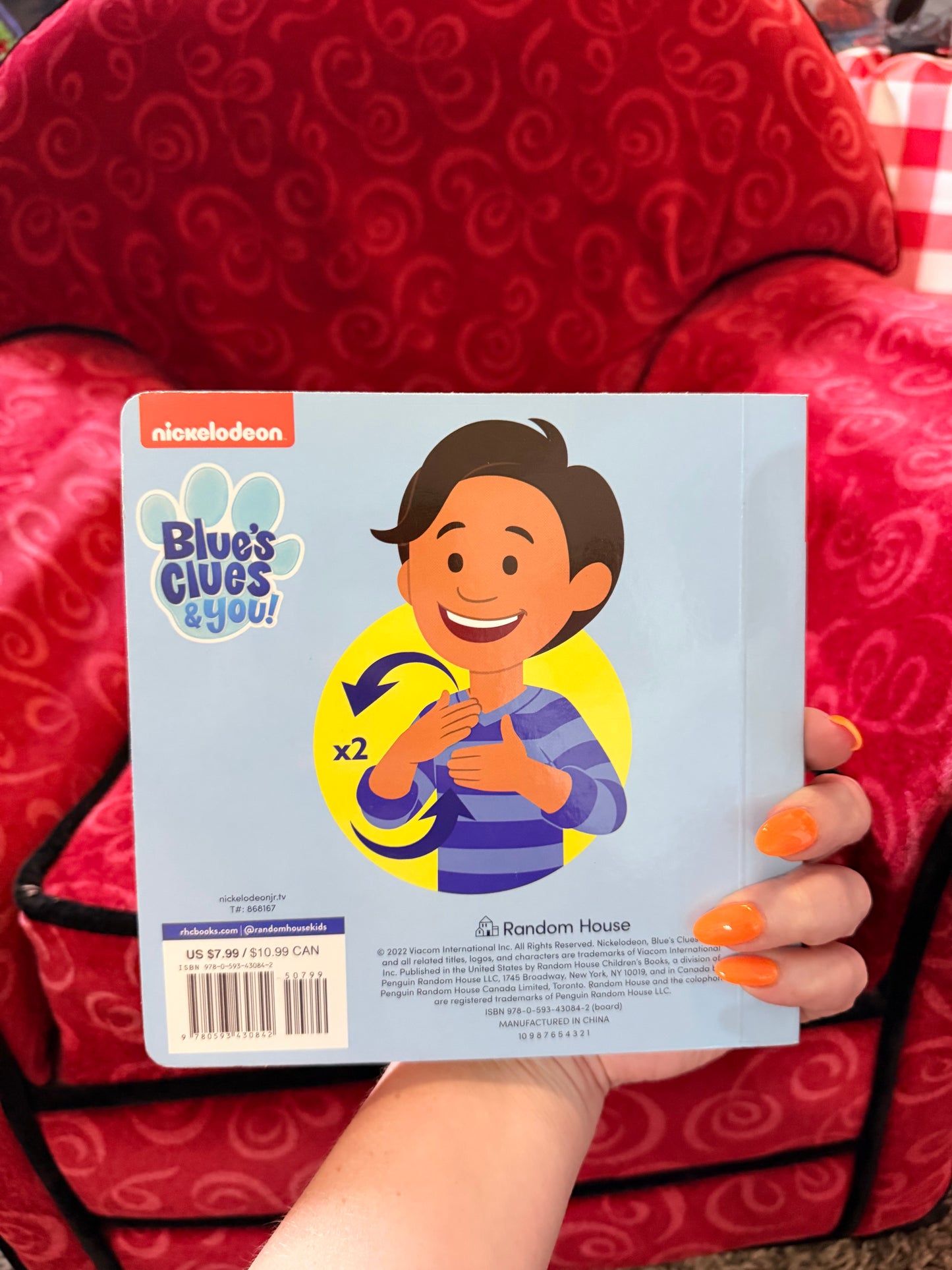 Sign with Blue book